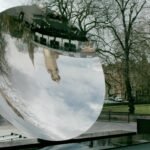 Curved reflective surface of Anish Kapoor’s Sky Mirror in Nottingham.